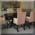 F21. Carved double pedestal dining table by Kindel Furniture. Includes pads and leaves. 